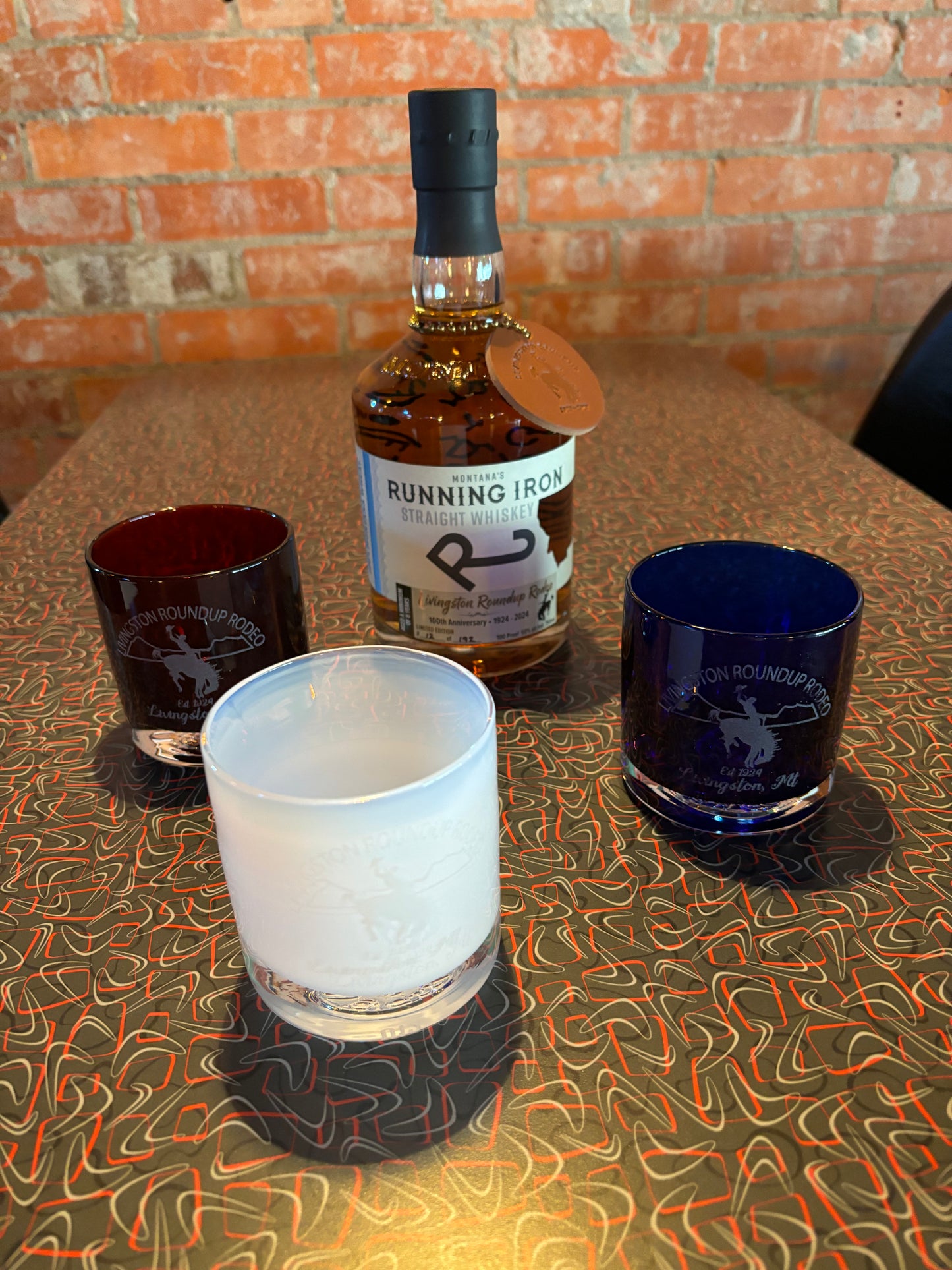 Red, White and Blue glassybaby Whiskey Glasses with matching numbered 100th Anniversary Whiskey